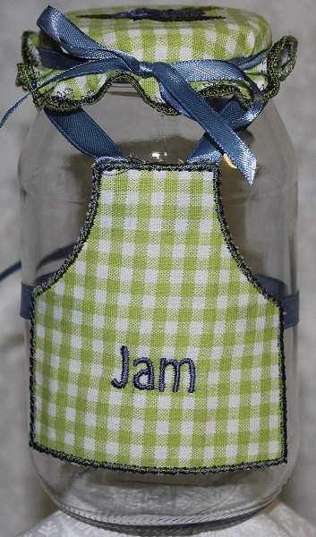 Image of bottle_with_topper_and_apron_1.jpg