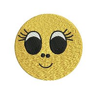 Embroidery design of a smiling face with big, adorable eyes.
